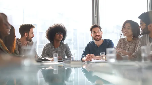 team, collaboration, meeting, business, professional, office, discussion, strategy, planning, communication, innovation, leadership, success, modern, workplace, growth opportunities, ideas, teamwork, initiative, development. Seven roles that keep B2B social selling accountable, from service owner to analyst